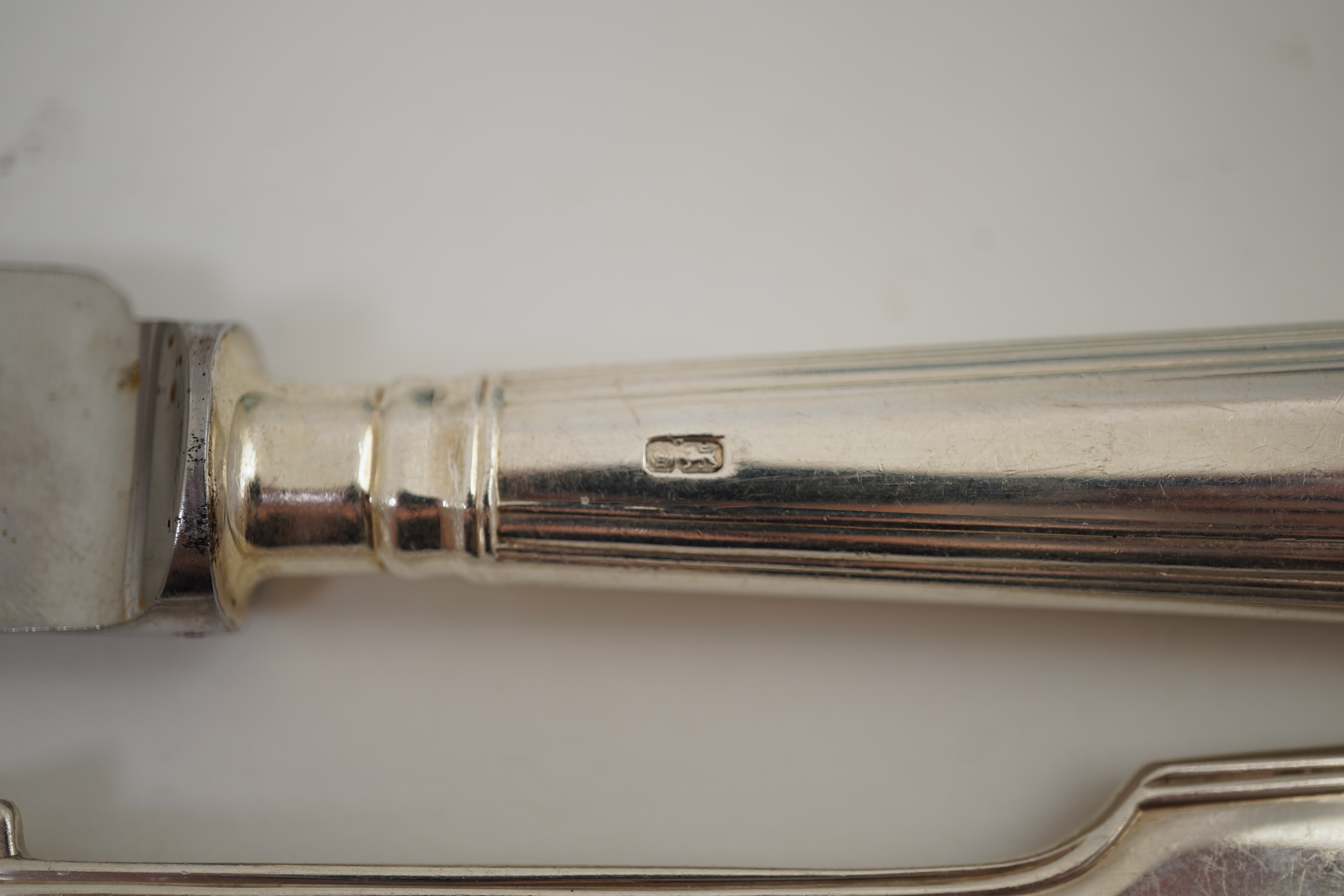 An Elizabeth II part canteen of silver fiddle, thread and shell pattern cutlery, by J B Chatterley & Sons Ltd